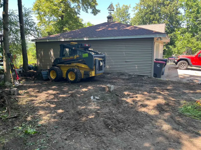 Side yard by the garage before