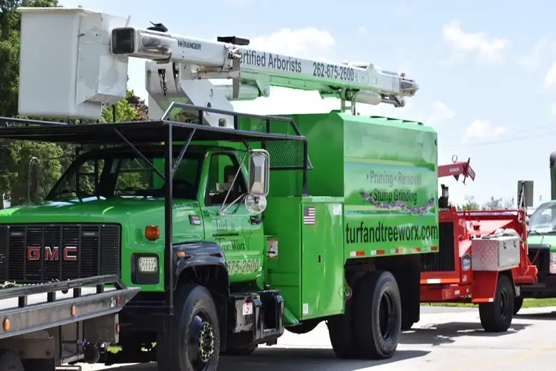 Turf & Tree Worx bucket truck in the Newburg Parade